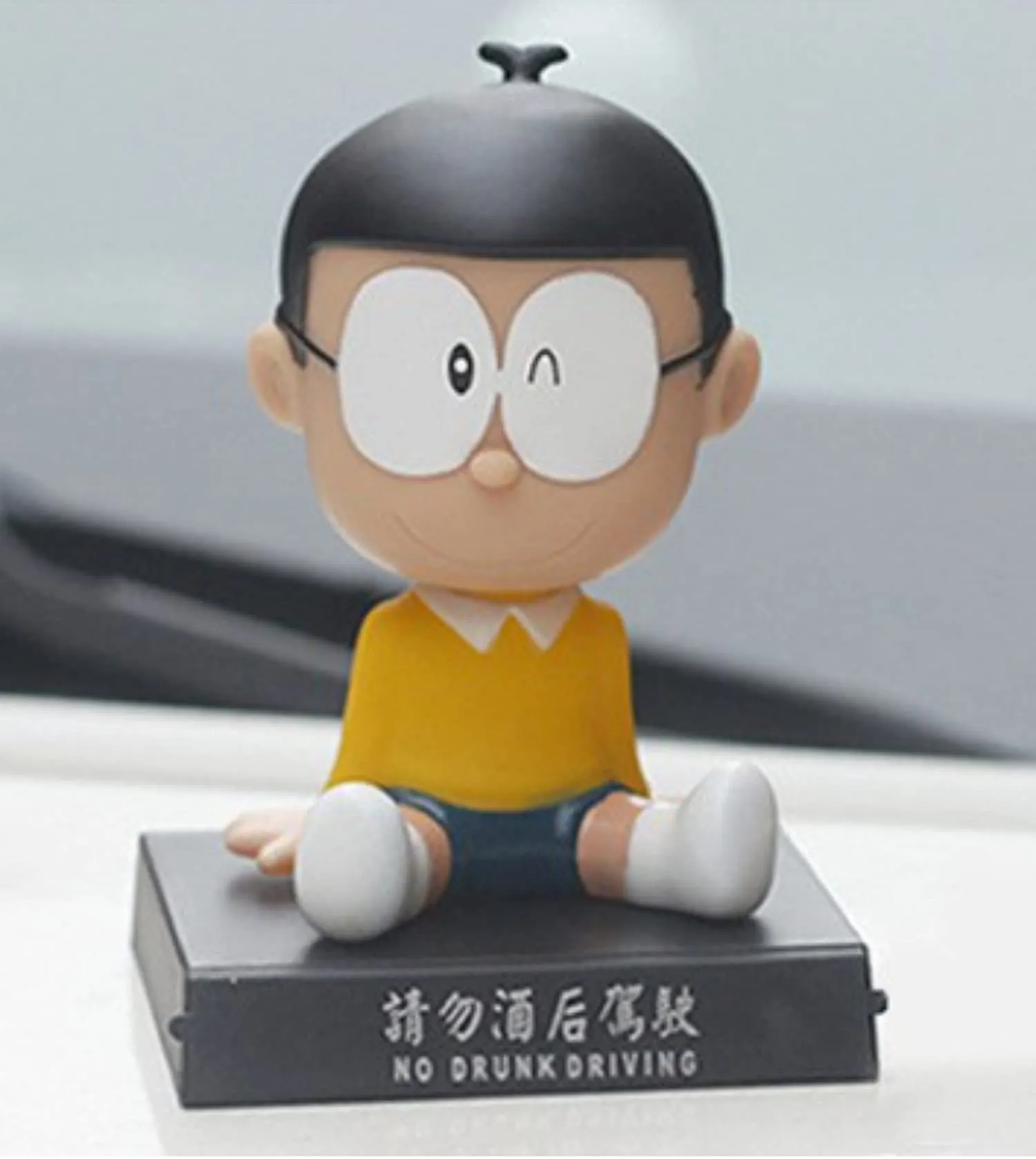 AUGEN Super Hero Nobita Doremon Action Figure Limited Edition Bobblehead with Mobile Holder for Car Dashboard, Office Desk & Study Table (Pack of 1)